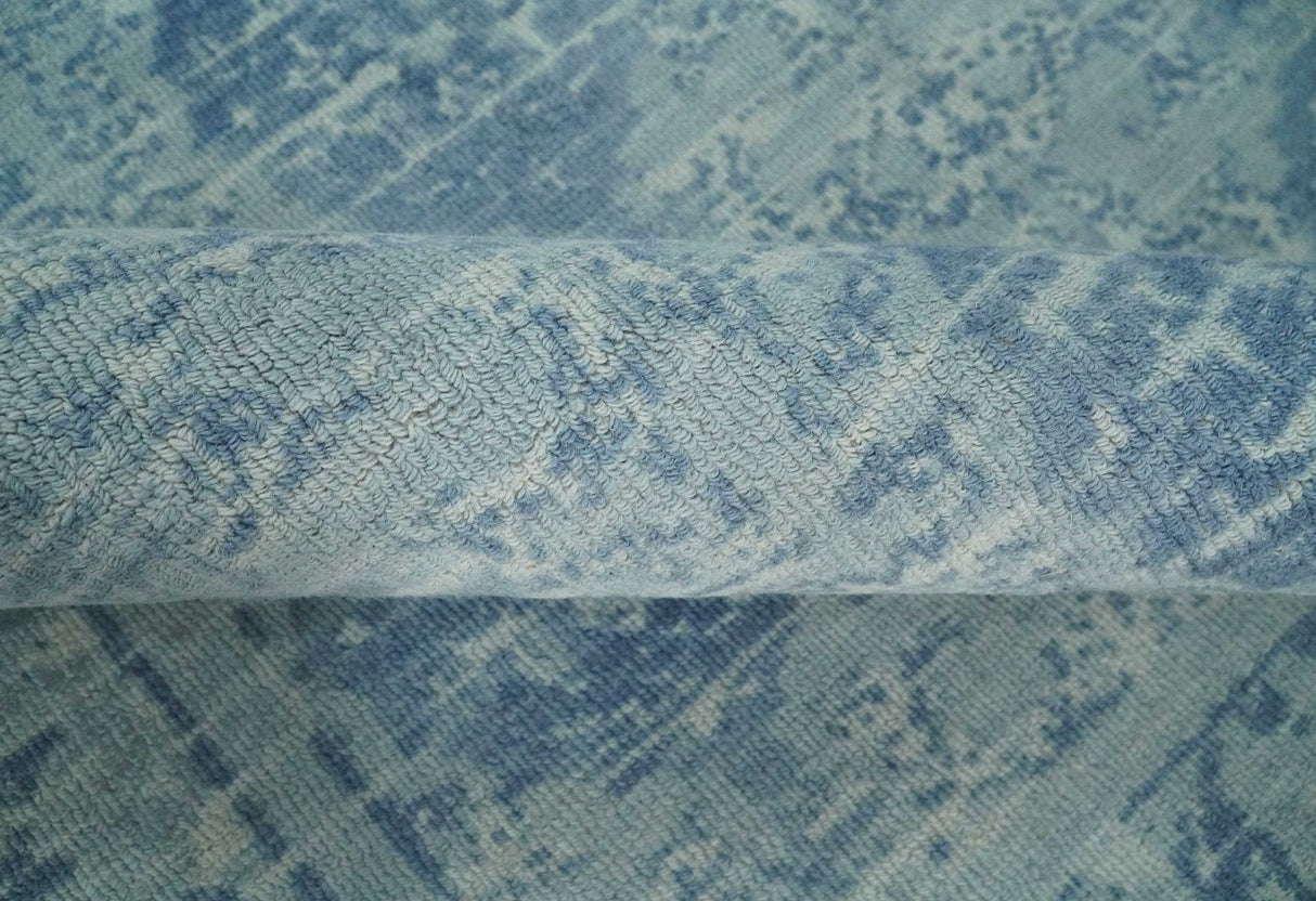 5x8 Ivory and Blue Traditional Ikat design Hand Tufted Wool Area Rug