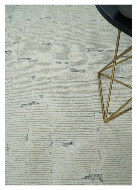 8x10 carved pattern Beige and Gray hand knotted wool rug