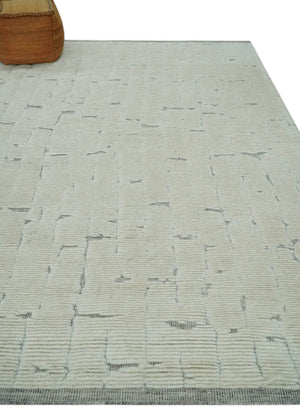 8x10 carved pattern Beige and Gray hand knotted wool rug