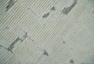 8x10 carved pattern Beige and Gray hand knotted wool rug