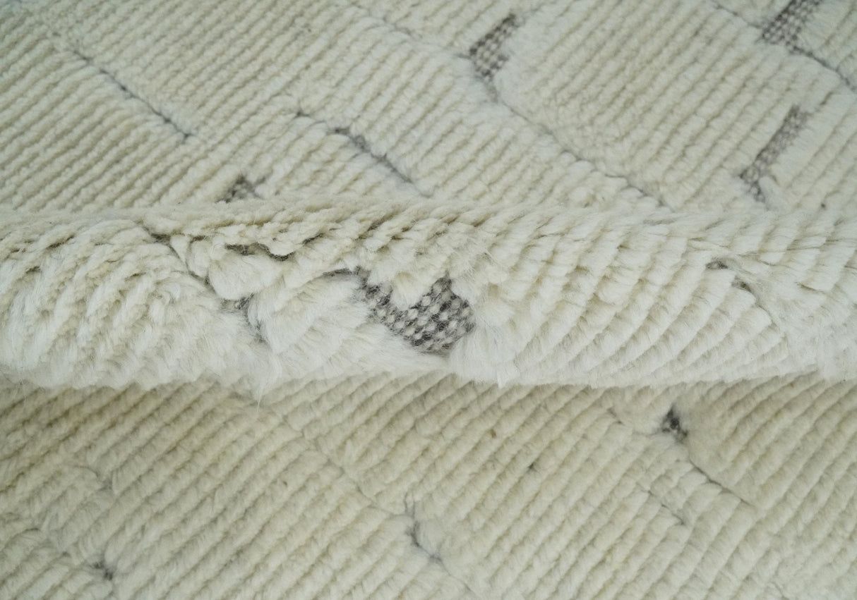 8x10 carved pattern Beige and Gray hand knotted wool rug