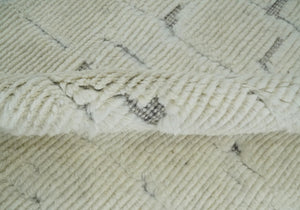 8x10 carved pattern Beige and Gray hand knotted wool rug
