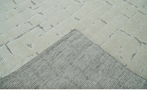 8x10 carved pattern Beige and Gray hand knotted wool rug
