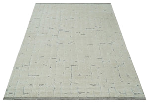 8x10 carved pattern Beige and Gray hand knotted wool rug