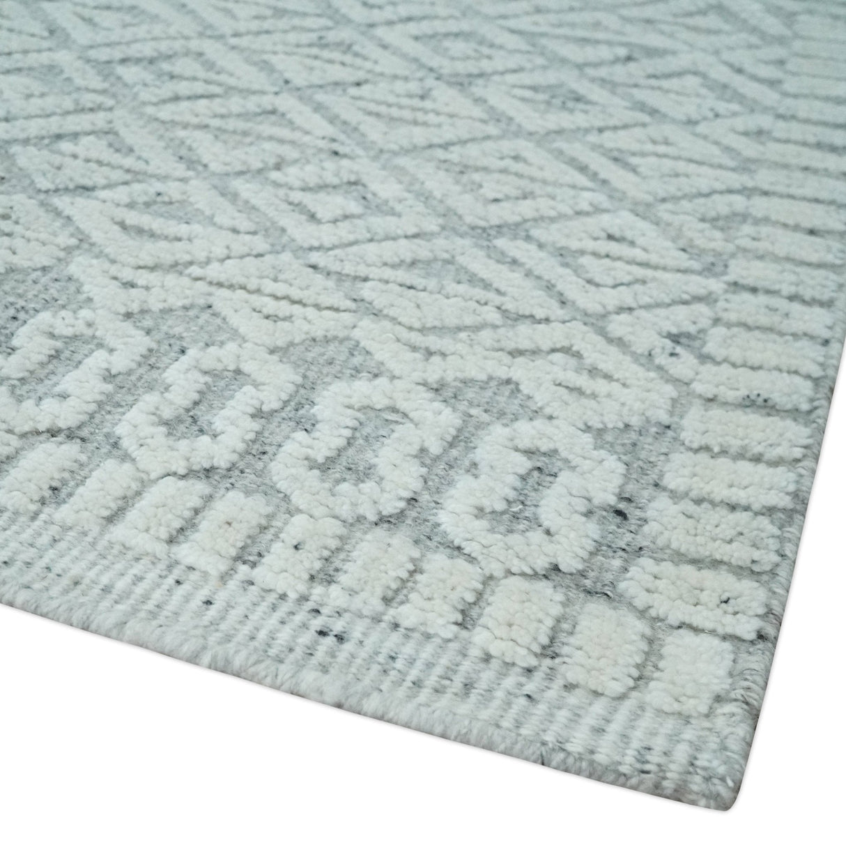 Contemporary 8x10 carved pattern Ivory and Gray hand knotted wool rug