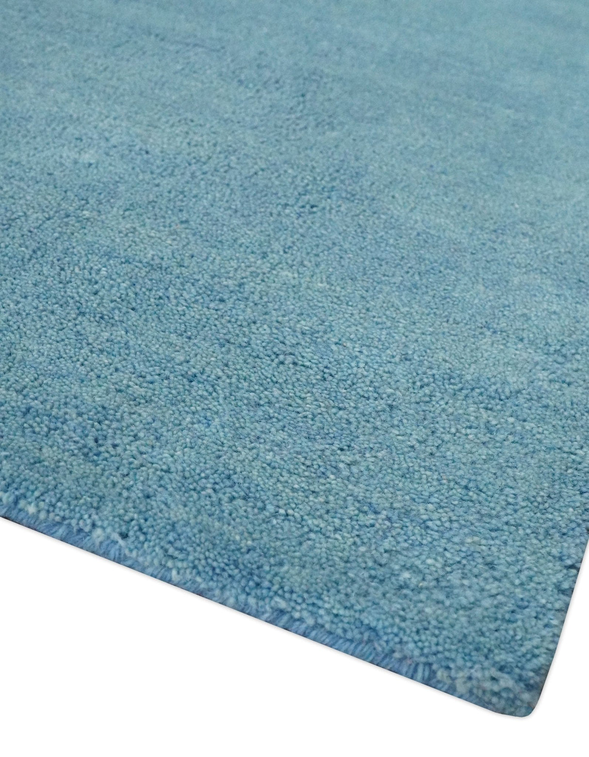 Hand Tufted Solid Plane Light Blue Woolen 8x10 wool Area Rug