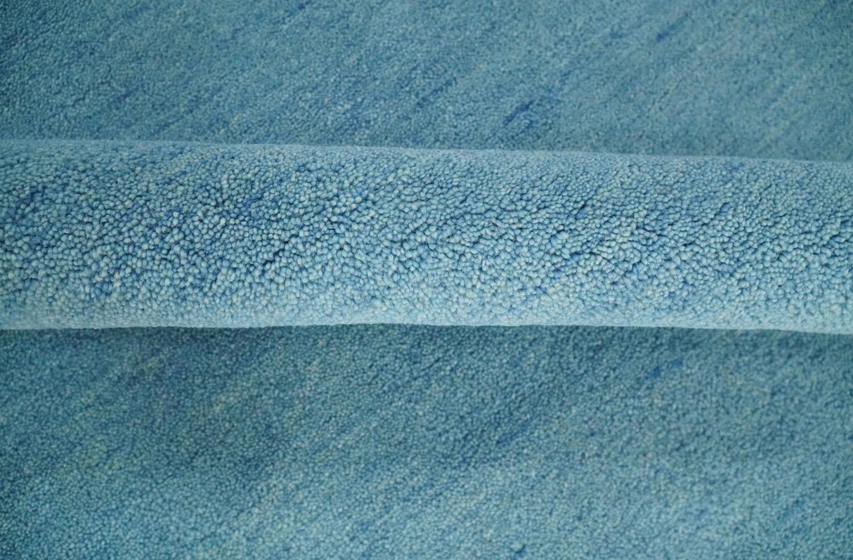 Hand Tufted Solid Plane Light Blue Woolen 8x10 wool Area Rug