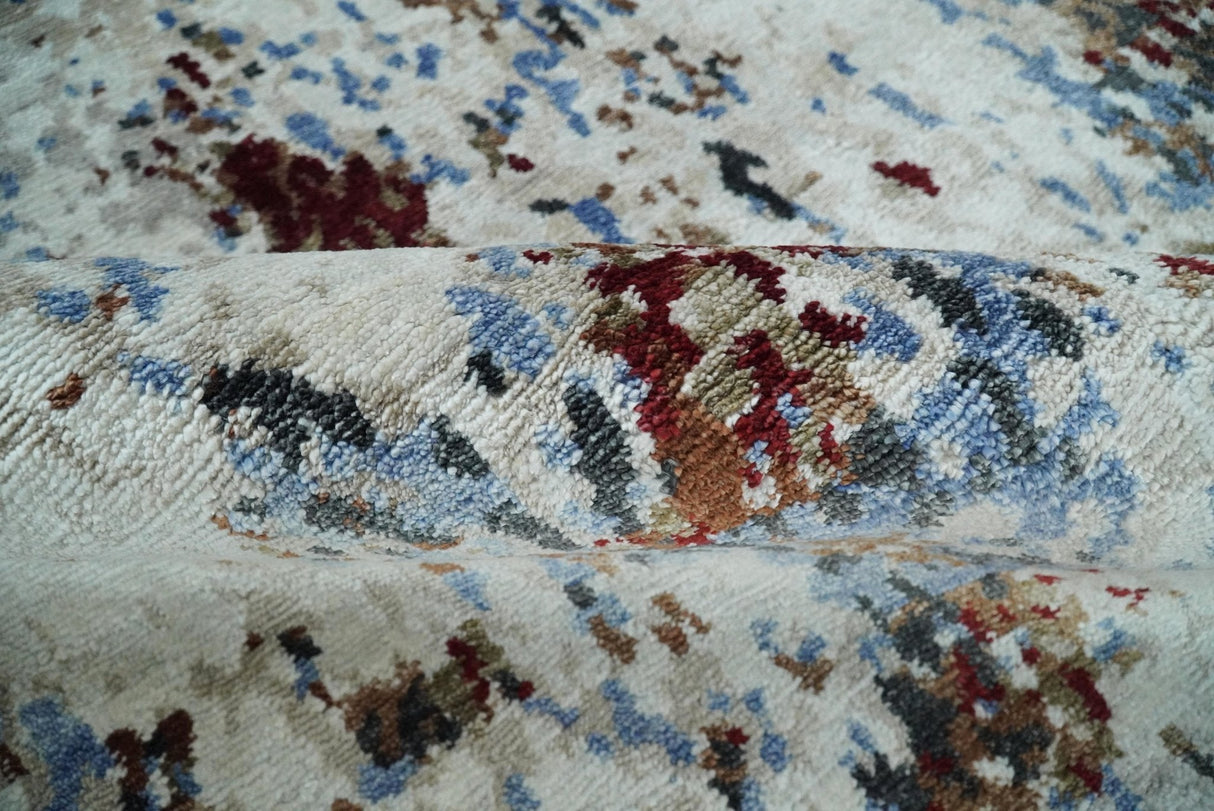Handmade 8x10 Ivory, Blue and Red Abstract bamboo Silk Area Rug | TRDS2810