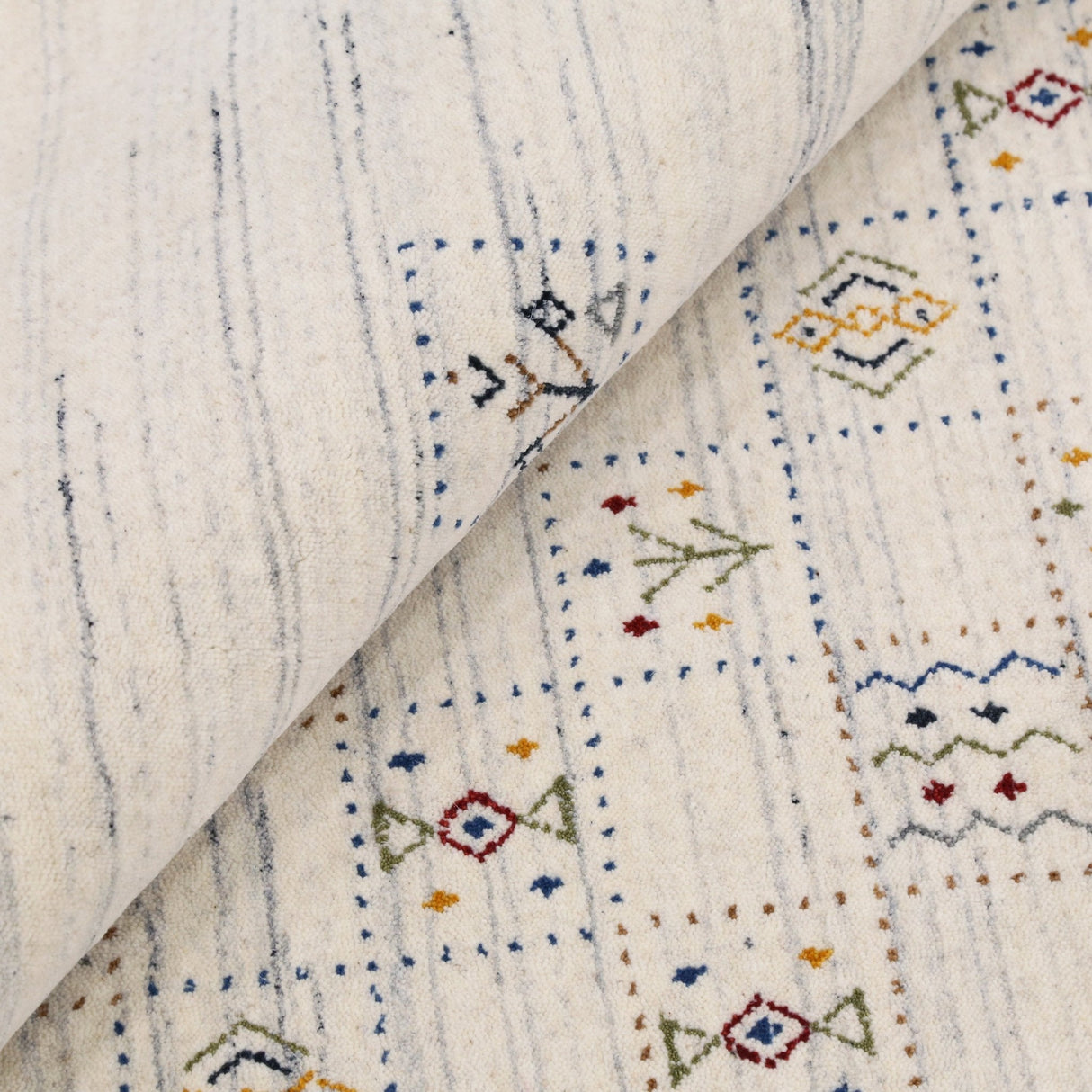 Ivory Tribal Design Hand Loomed Wool Area Rug