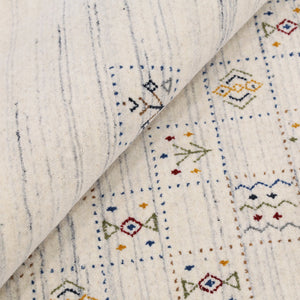 Ivory Tribal Design Hand Loomed Wool Area Rug