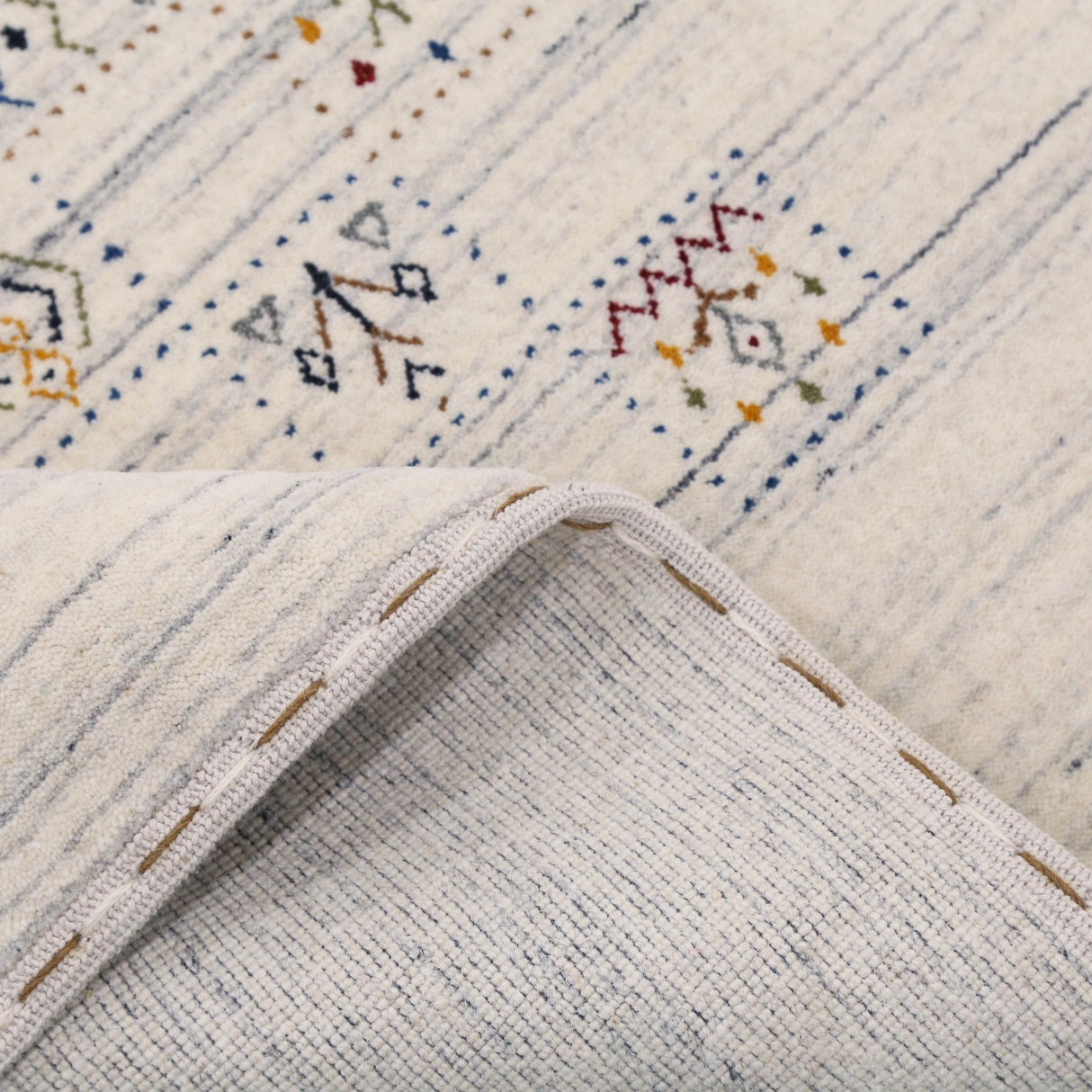 Ivory Tribal Design Hand Loomed Wool Area Rug