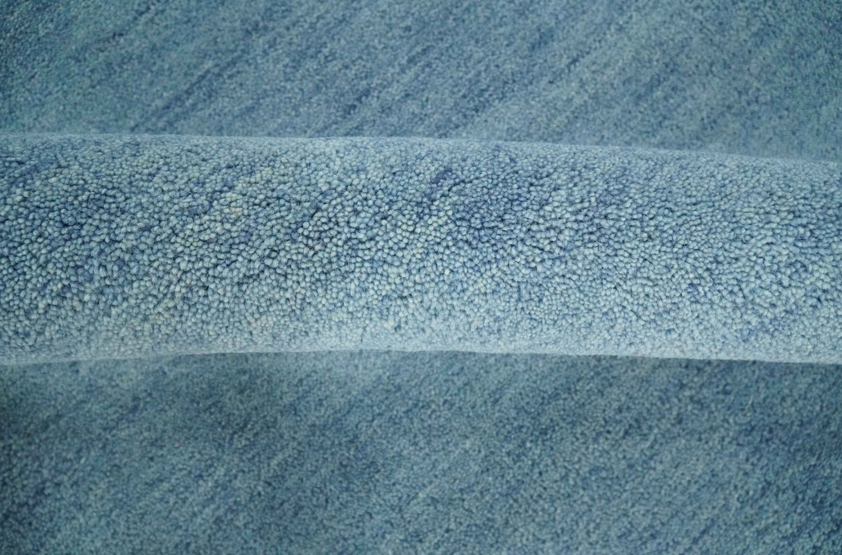Solid Light Blue Woolen Hand Tufted 8x10 contemporary area Rug