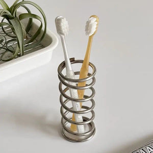 Spring Toothbrush Holder