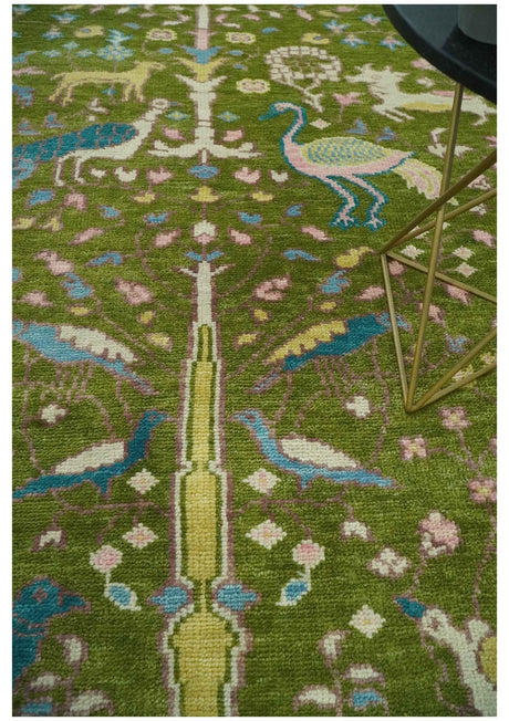 The Green Jungle Life Teal and Peach Peacock Bird Hand Knotted 8x10 Wool Area Rug