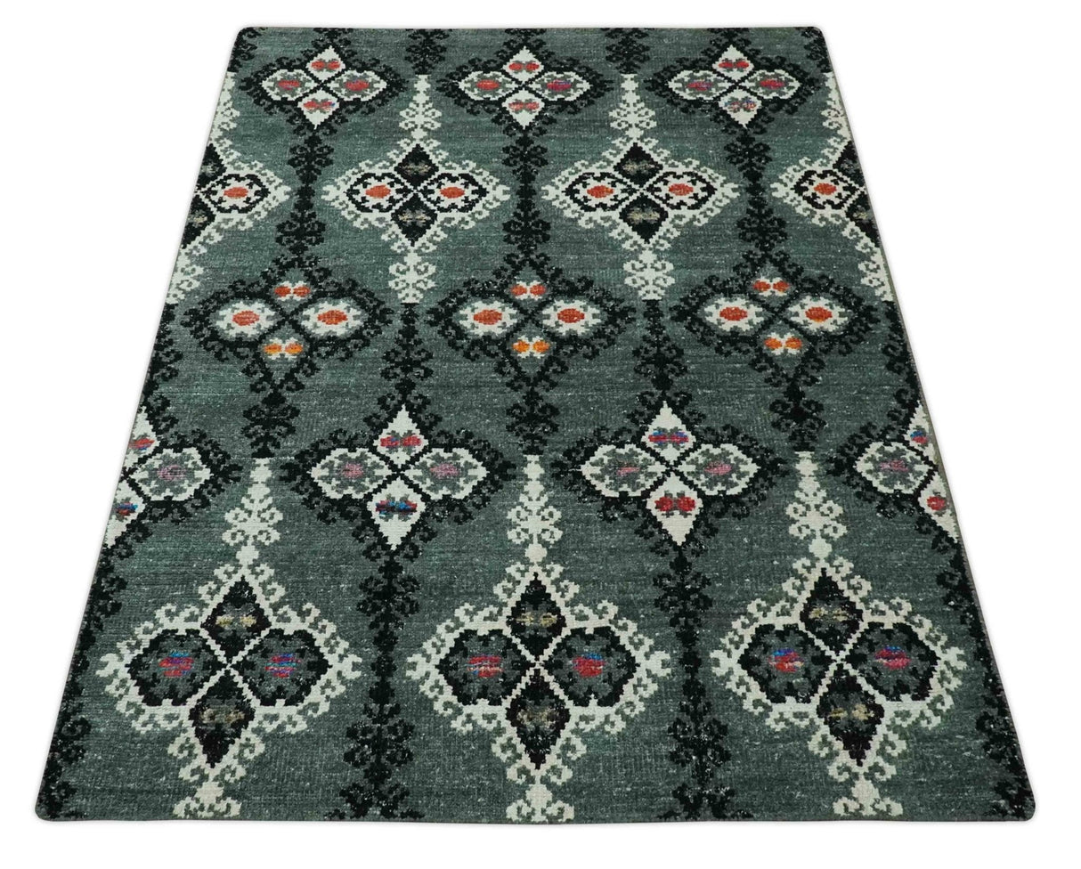 Traditional Ikat Design 5x7.6 Green, Black and Ivory Hand Knotted wool area rug