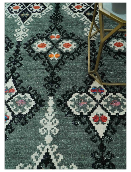 Traditional Ikat Design 5x7.6 Green, Black and Ivory Hand Knotted wool area rug