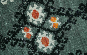 Traditional Ikat Design 5x7.6 Green, Black and Ivory Hand Knotted wool area rug