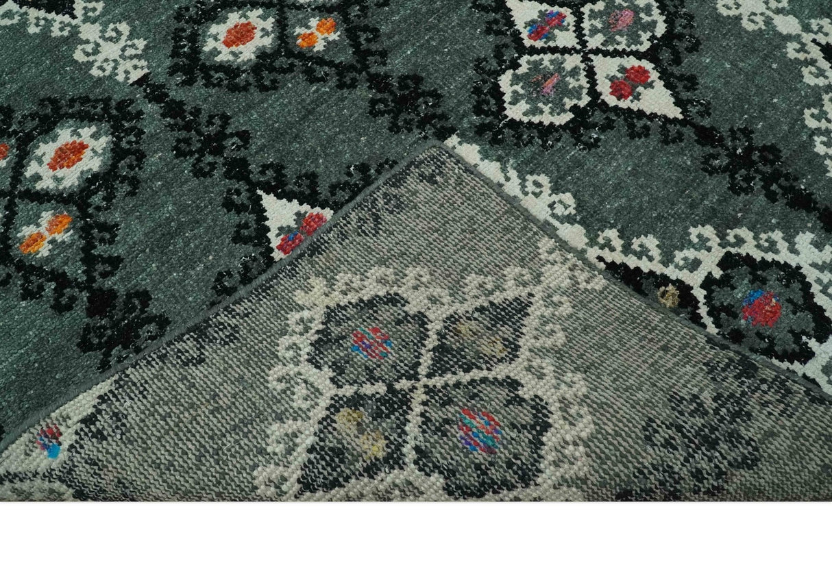 Traditional Ikat Design 5x7.6 Green, Black and Ivory Hand Knotted wool area rug