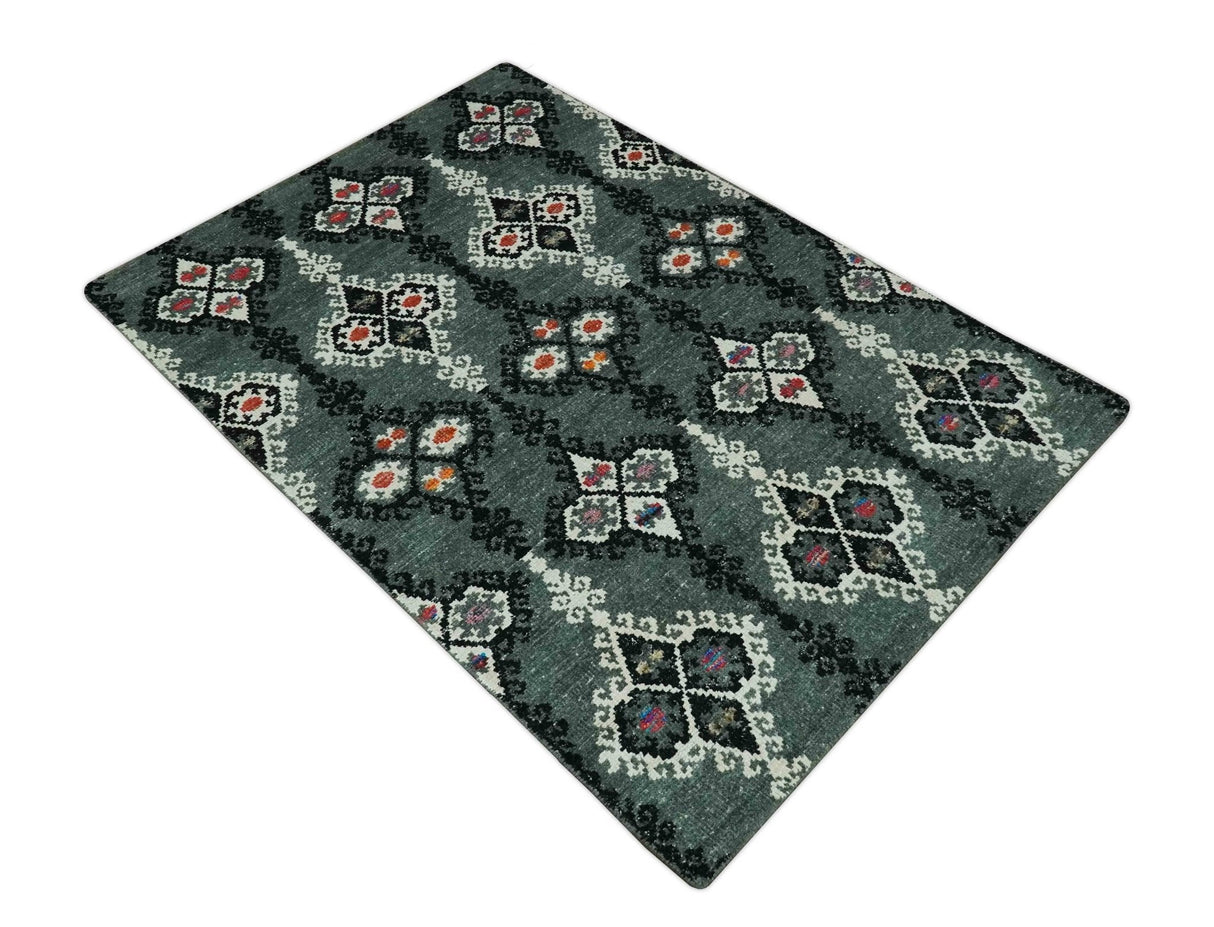 Traditional Ikat Design 5x7.6 Green, Black and Ivory Hand Knotted wool area rug